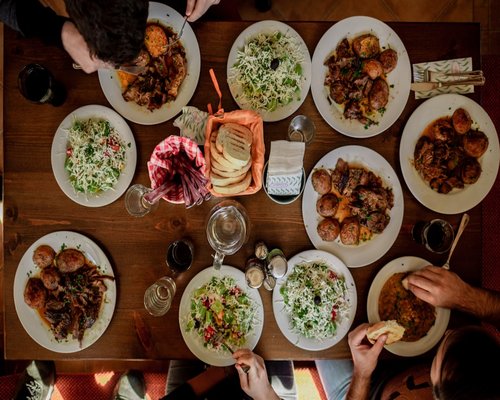 A warm, simple family meal on a wooden table